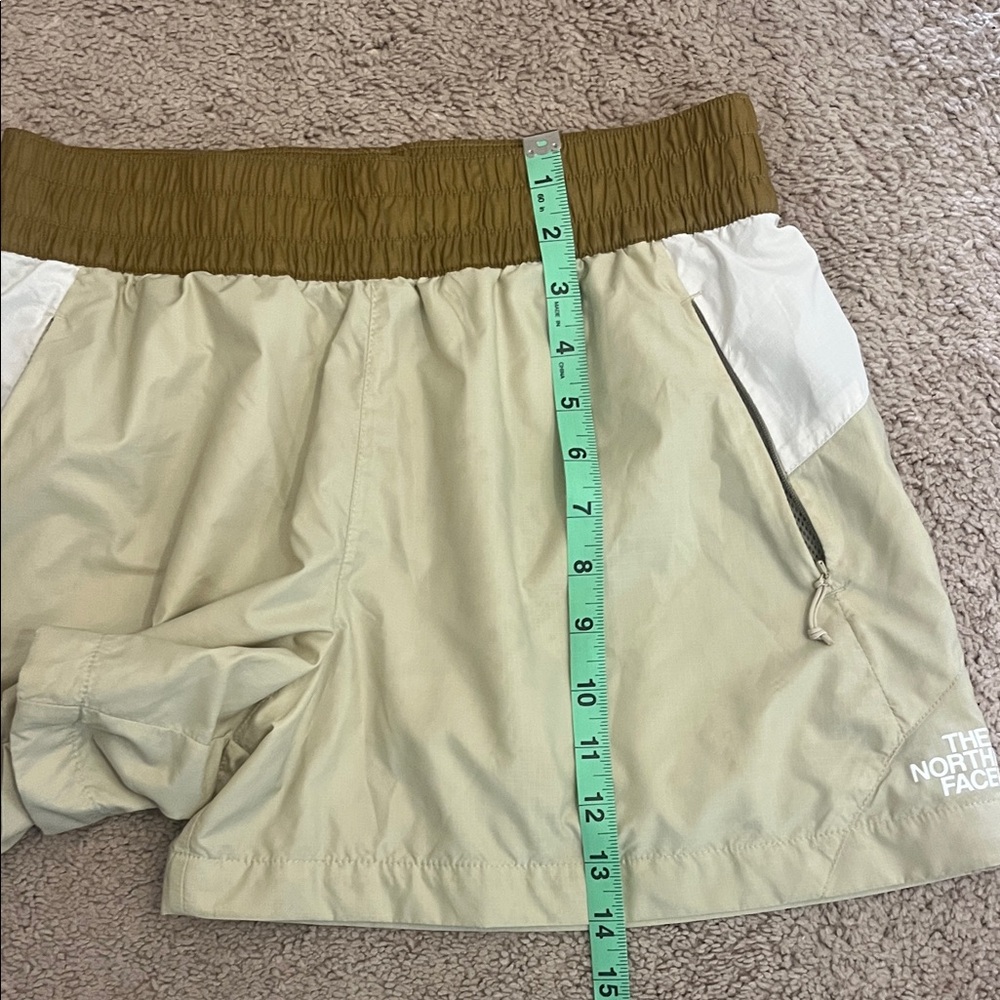 The North Face Women’s WindWall TNF X size Small Tan, White/Cream Running Shorts - Picture 10 of 10